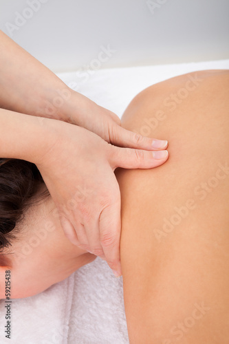Woman Getting Treatment For Her Neck