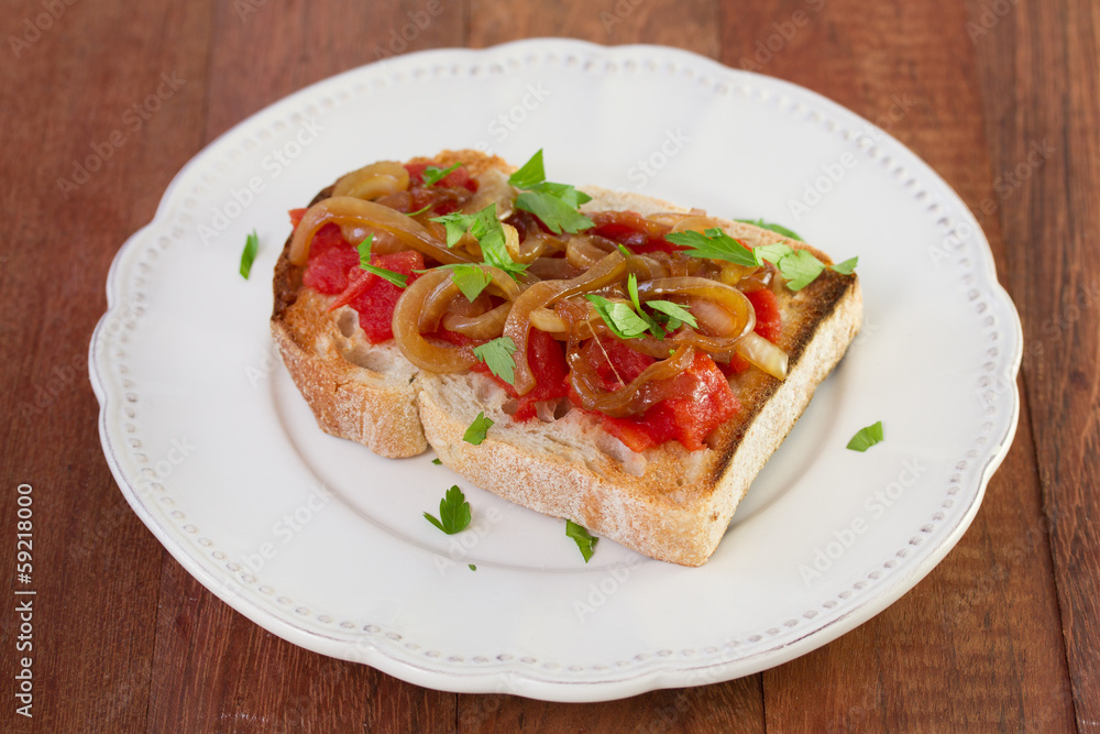bread with tomato, onion and parsley