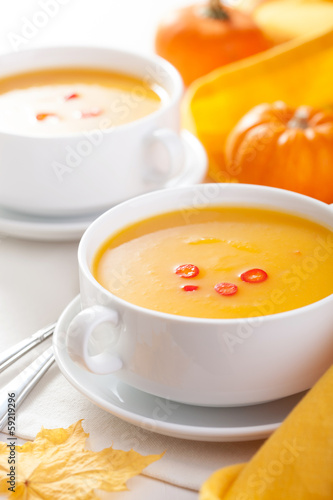 pumpkin soup in white bowl