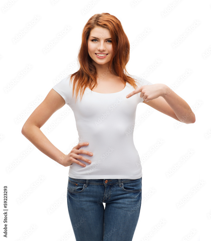 Fototapeta premium smiling teenager in blank white t-shirt