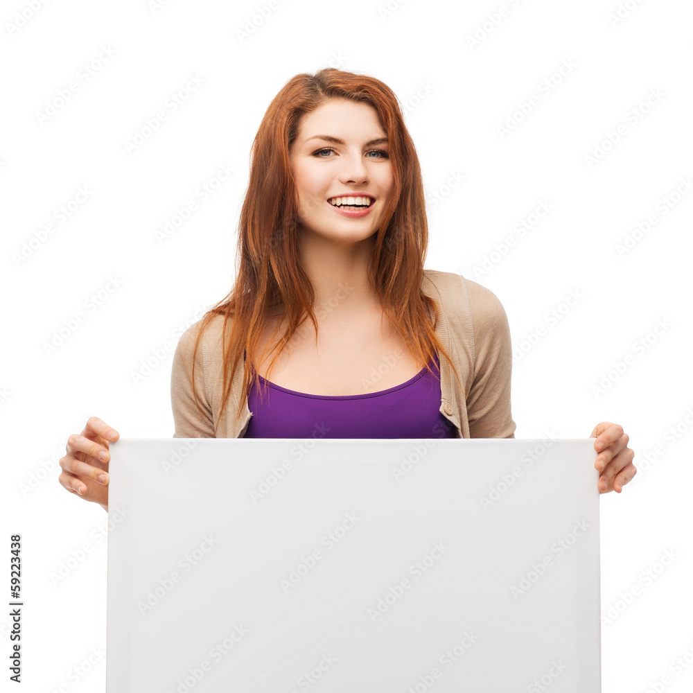 smiling young girl with blank white board