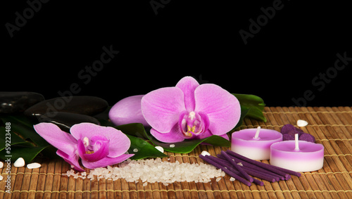 Orchid flowers  set for Spa on the bamboo cloth