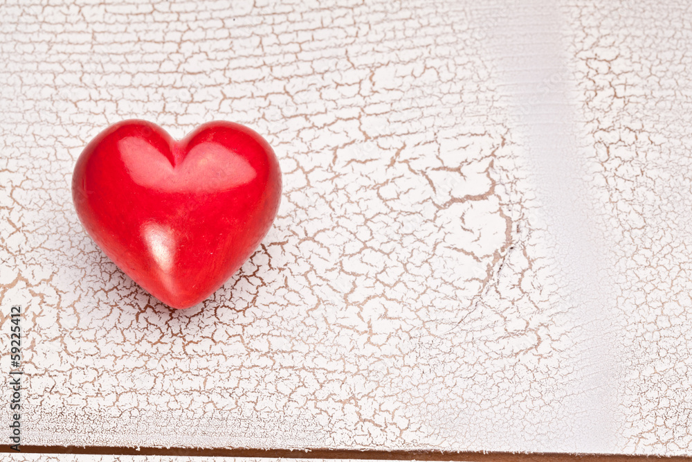 Valentines Day. Red heart on a wooden table. Valentines Day. Red heart on a wooden table.