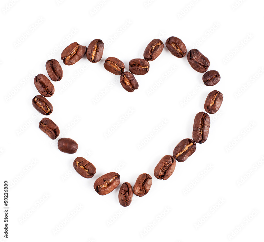 coffee beans on a white background. heart. love. texture coffee beans on a white background. heart. love. texture