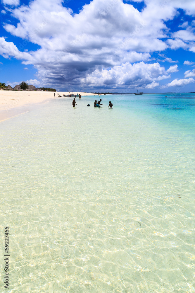 Tropical beach with resort