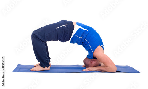Sport man exercise yoga. Stand on knee yoga asana