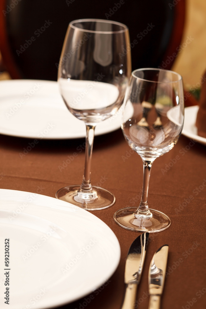 Tables set for meal Tables set for meal