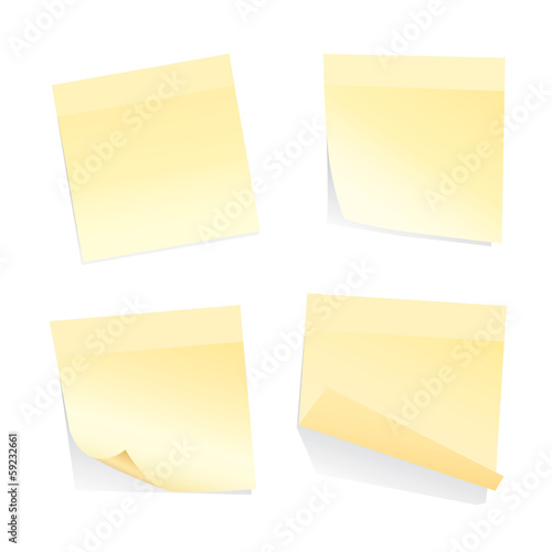 yellow stick notes isolated on white background