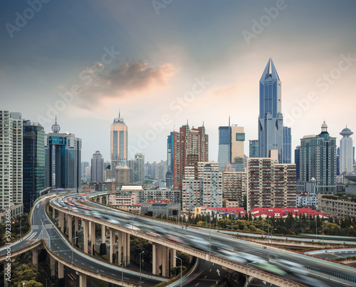 city skyline with elevated road
