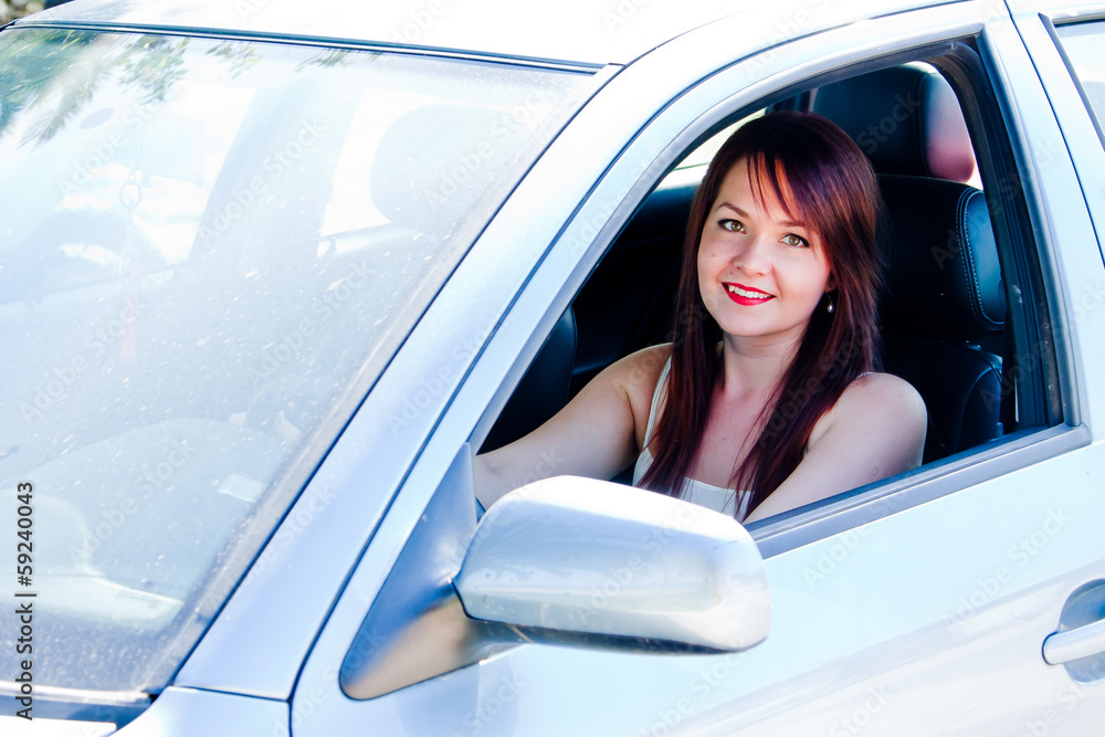 young and beautiful woman driving a car young and beautiful woman driving a car