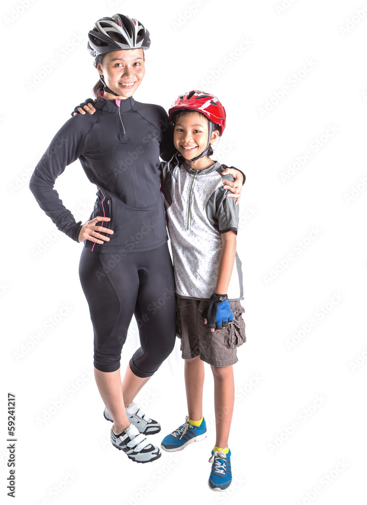 Obraz premium Mother and daughter with cycling attire over white background