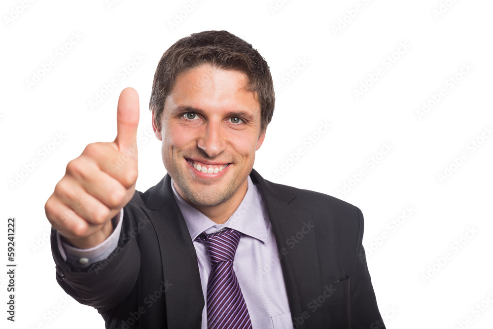 Close-up of a businessman gesturing thumbs up Close-up of a businessman gesturing thumbs up