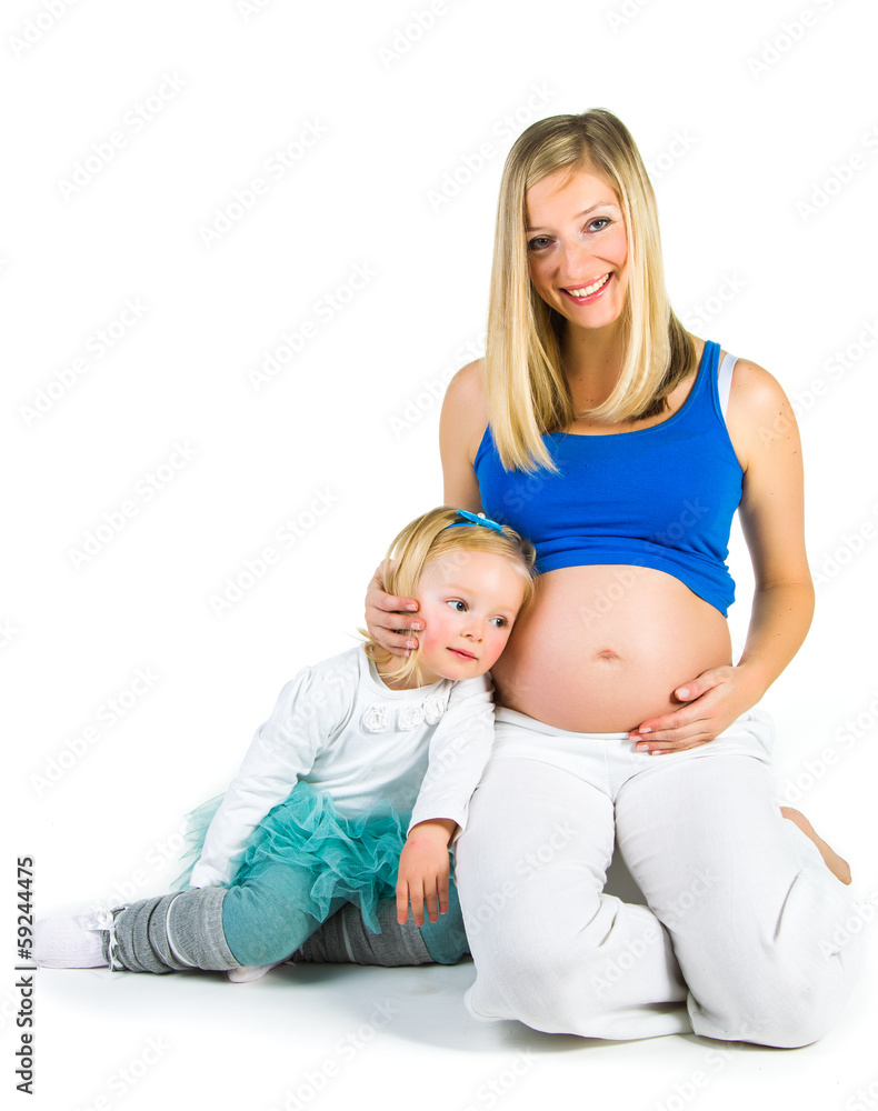 Pregnant woman with 2 zo daughter on white