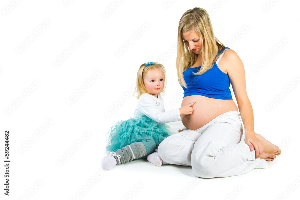 Pregnant woman with 2 zo daughter on white Pregnant woman with 2 zo daughter on white