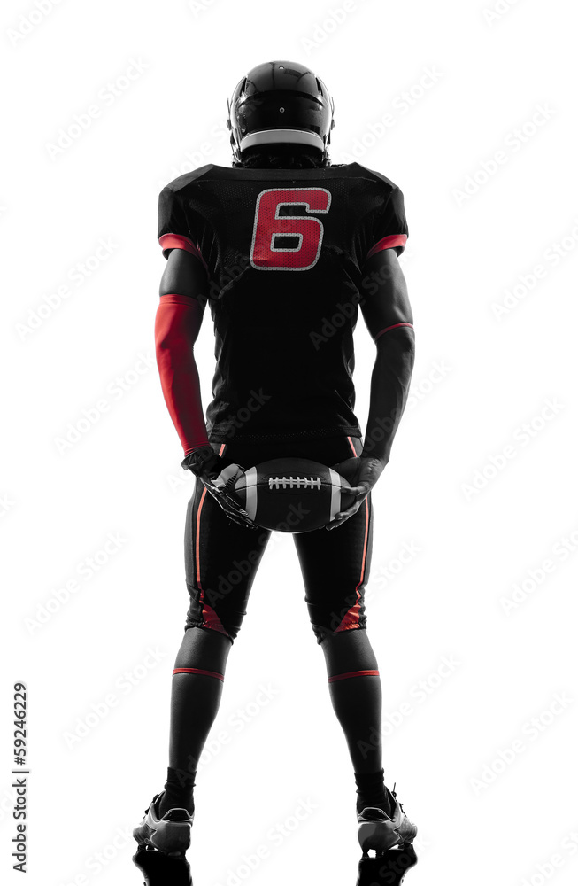 american football player standing holding ball silhouette american football player standing holding ball silhouette