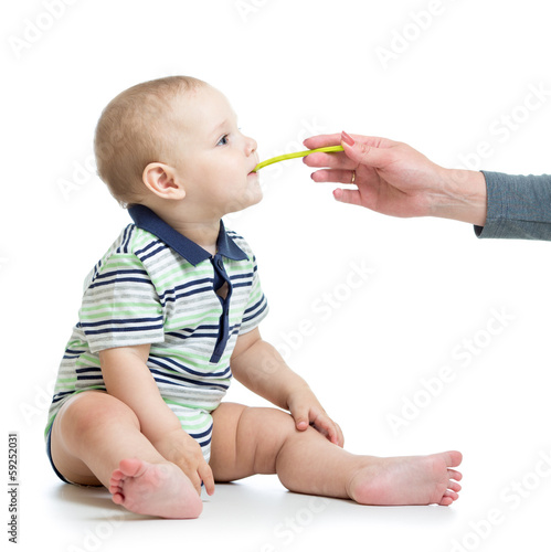 baby feeding with a spoon