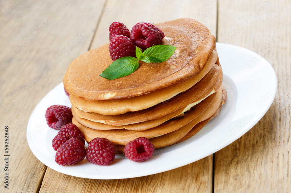 Ready to eat pancakes with raspberry Ready to eat pancakes with raspberry