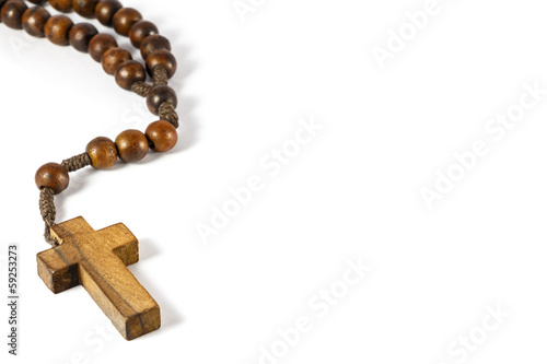 wood rosary with cross at left border
