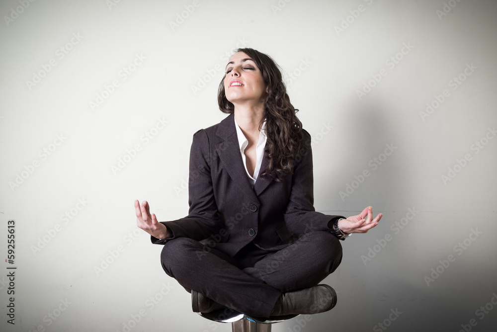 meditating beautiful young businesswoman meditating beautiful young businesswoman