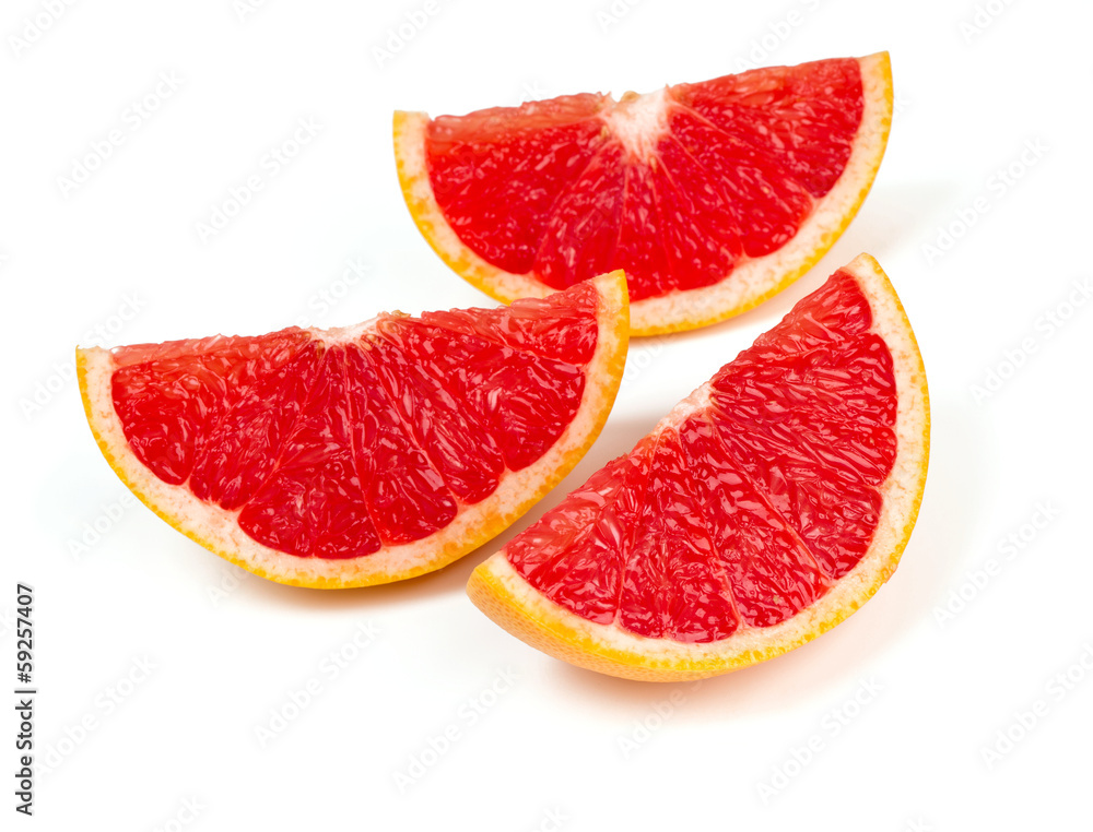 cut red grapefruit isolated on white cut red grapefruit isolated on white