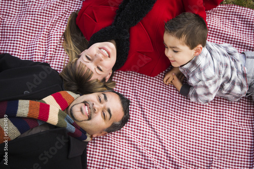 Family in Winter Clothing L...
