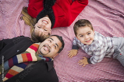 Family in Winter Clothing L...