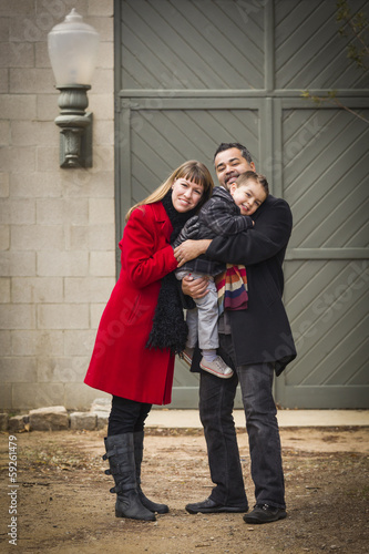 Warmly Dressed Family Lovin...