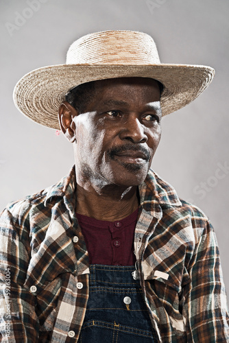 Retro senior afro american blues man in times of slavery. Wearin