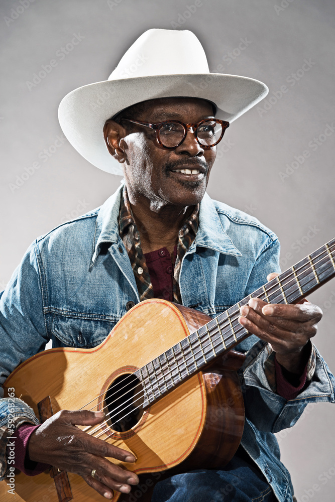 Retro senior afro american blues man in times of slavery. Wearin Retro senior afro american blues man in times of slavery. Wearin