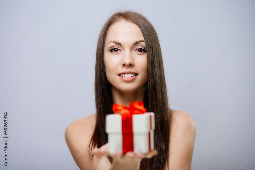 Gorgeous brunette with present Gorgeous brunette with present