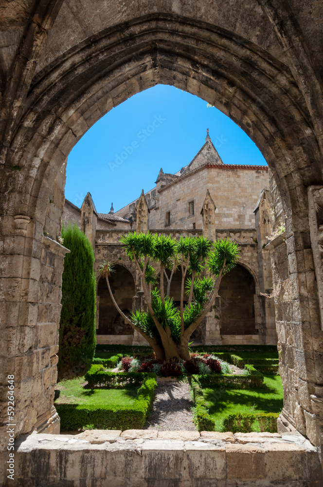 Arc and garden at Saint Just Cathedral  cloister at Narbonne in