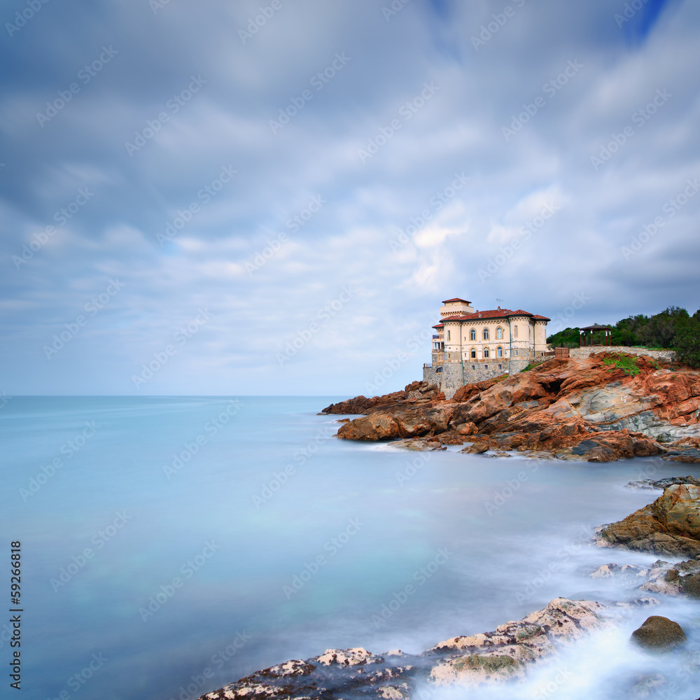 Boccale castle landmark on cliff rock and sea. Tuscany, Italy.
