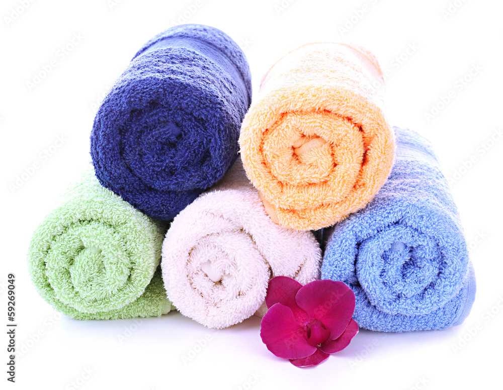 Orchid flower and towel rolls, isolated on white Orchid flower and towel rolls, isolated on white