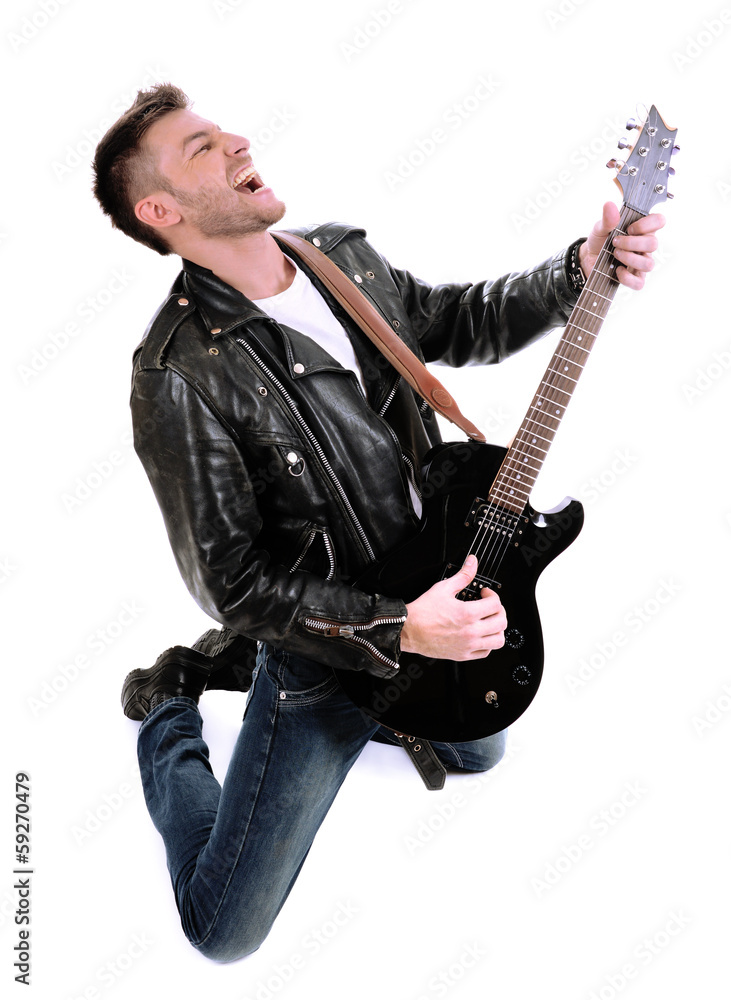 Young musician playing  guitar, isolated on white