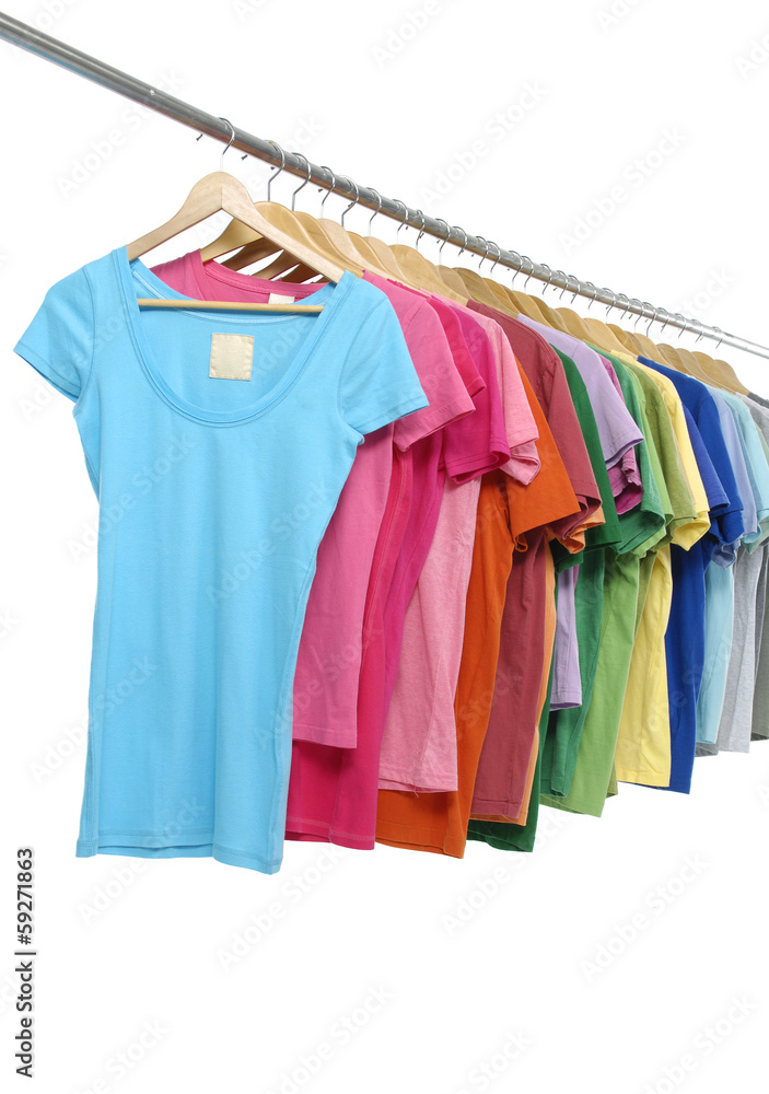 Row of many peignoir hanging on wooden hangers Row of many peignoir hanging on wooden hangers