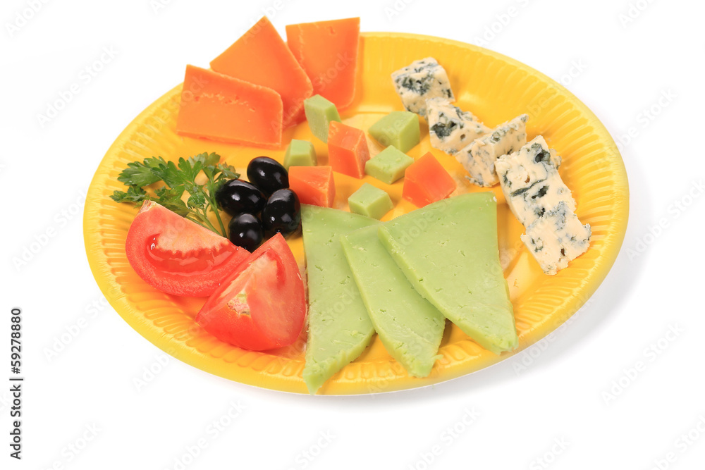 Various cheese on yellow platter. Various cheese on yellow platter.