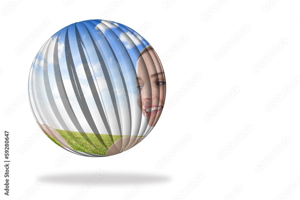 Smiling woman in field on abstract screen