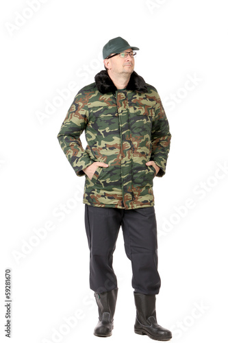 Man in military vest.