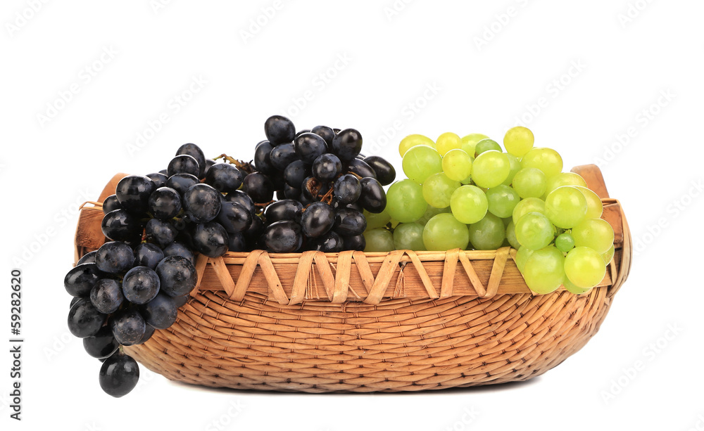 Greenand black grapes in basket. Greenand black grapes in basket.