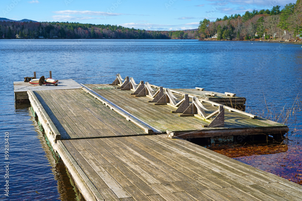 Floating dock leading to a small lake