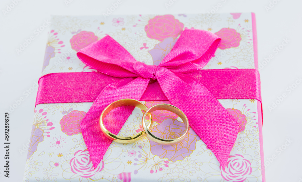Wedding rings on gift box Wedding rings on gift box