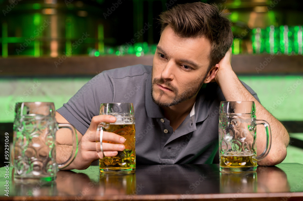 Lonely man in bar.