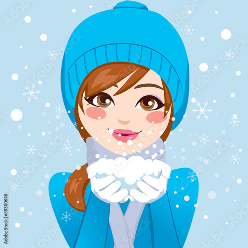 Cute Woman Blowing Snowflakes