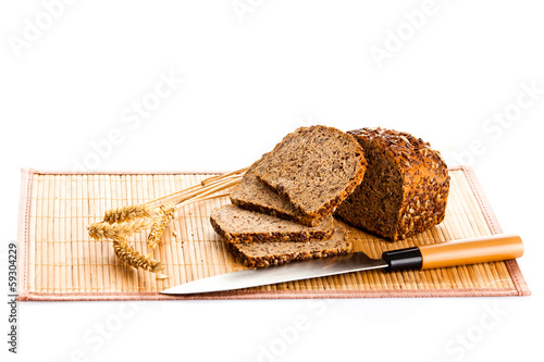  Brown seed biobread isolated on white background photo