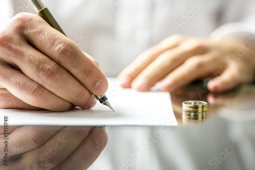 Signing  divorce papers photo