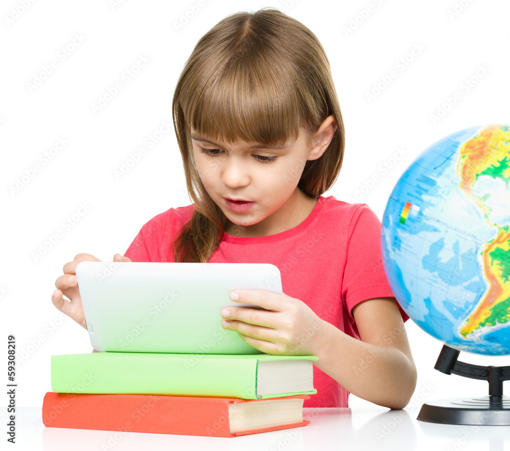 Young girl is using tablet Young girl is using tablet