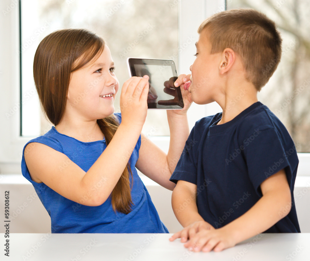 Children are using tablet Children are using tablet