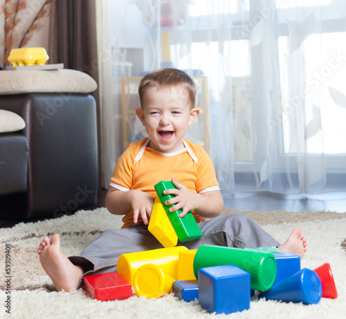 Child playing with building...
