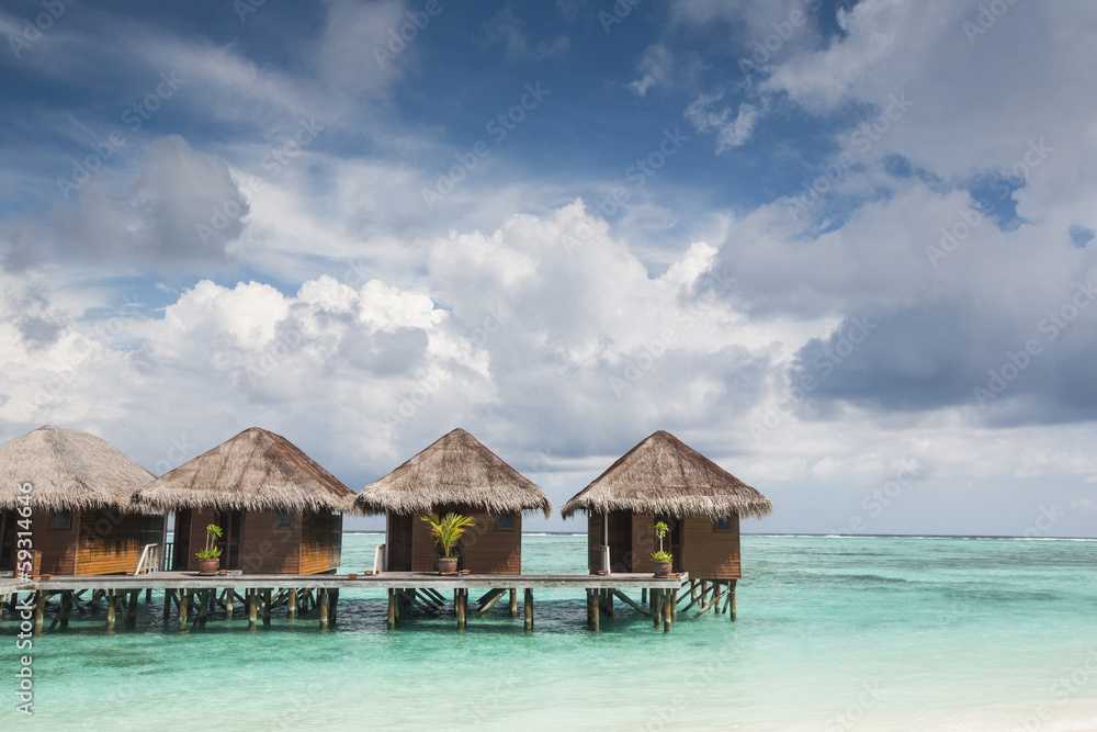 Small wooden houses on sea