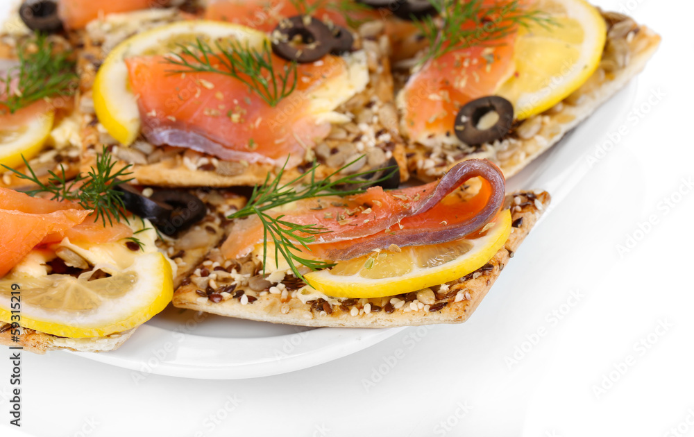 Salmon sandwiches on plate isolated on white Salmon sandwiches on plate isolated on white